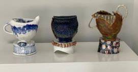 3 ceramic trophies with different colours and patterns