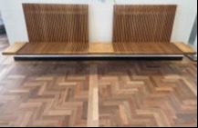 brown slat foyer bench in ACT Assembly foyer