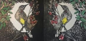 Painting of two birds mirrored sitting in a tree