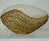 blown glass object with brown wave pattern along the bottom two thirds