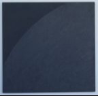 3 dark glass squares with slight half-moon shaped engraving on each