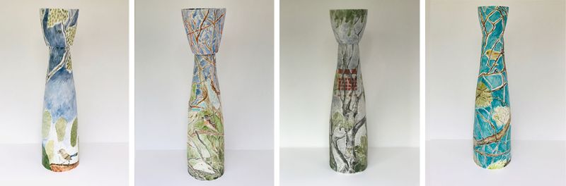 photo of 4 ceramic porcelain vases with various bird designs