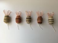 photo of 5 woven baskets using local materials