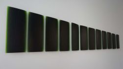 12 glass rectangle patterns arranged in descending sized - similar to a xylophone