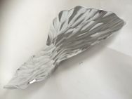aluminium sculpture shaped into feather type structure