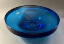 blue transparent flat bowl made from glass